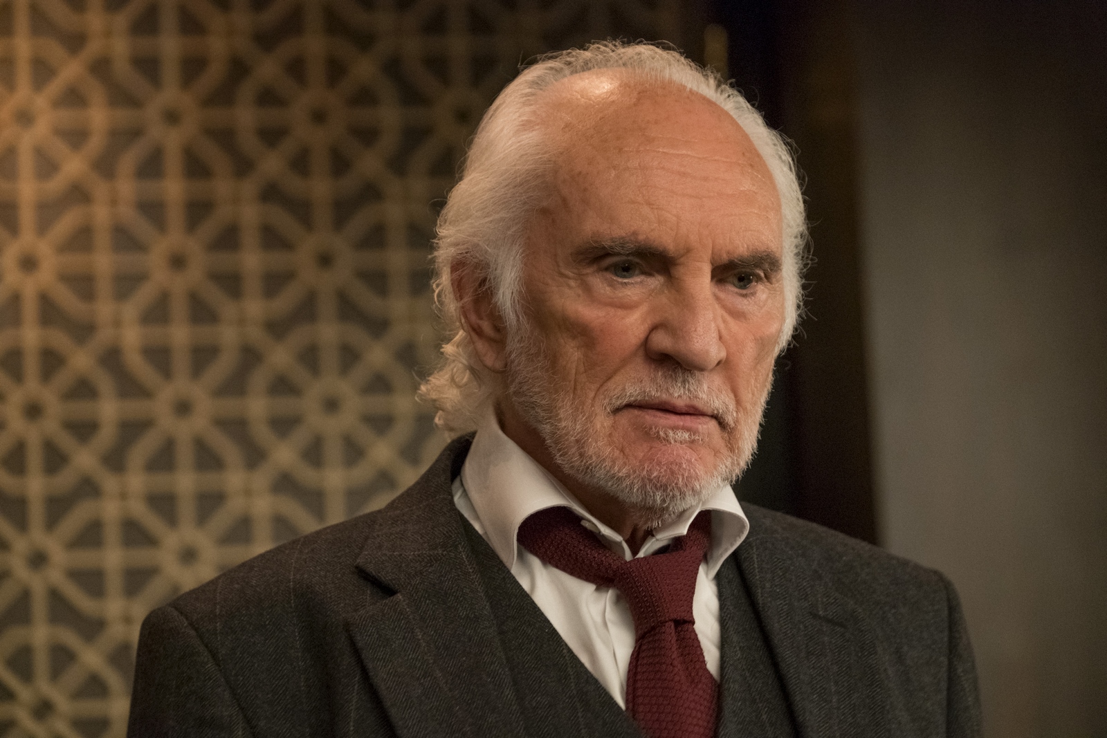 Terence Stamp como Malcolm Quince